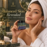 A woman in a white robe and towel wrap holds a jar of AEMLIE Purify Complex Ultra Mask in a luxurious bathroom setting. The image includes promotional text reading 'Balanced Skin Revealed'.